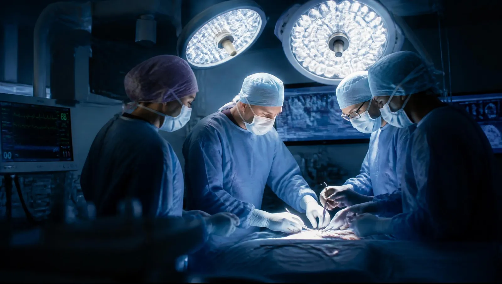 Surgical team performing a procedure in an operating room